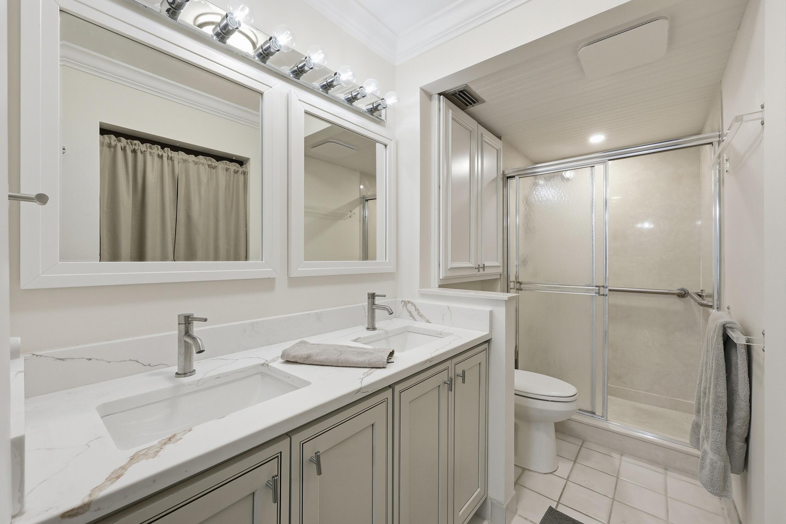 5111 Southeast Miles Grant Road, Unit 102 Stuart, FL 34997 - Photo 19 of 30 Primary Bedroom