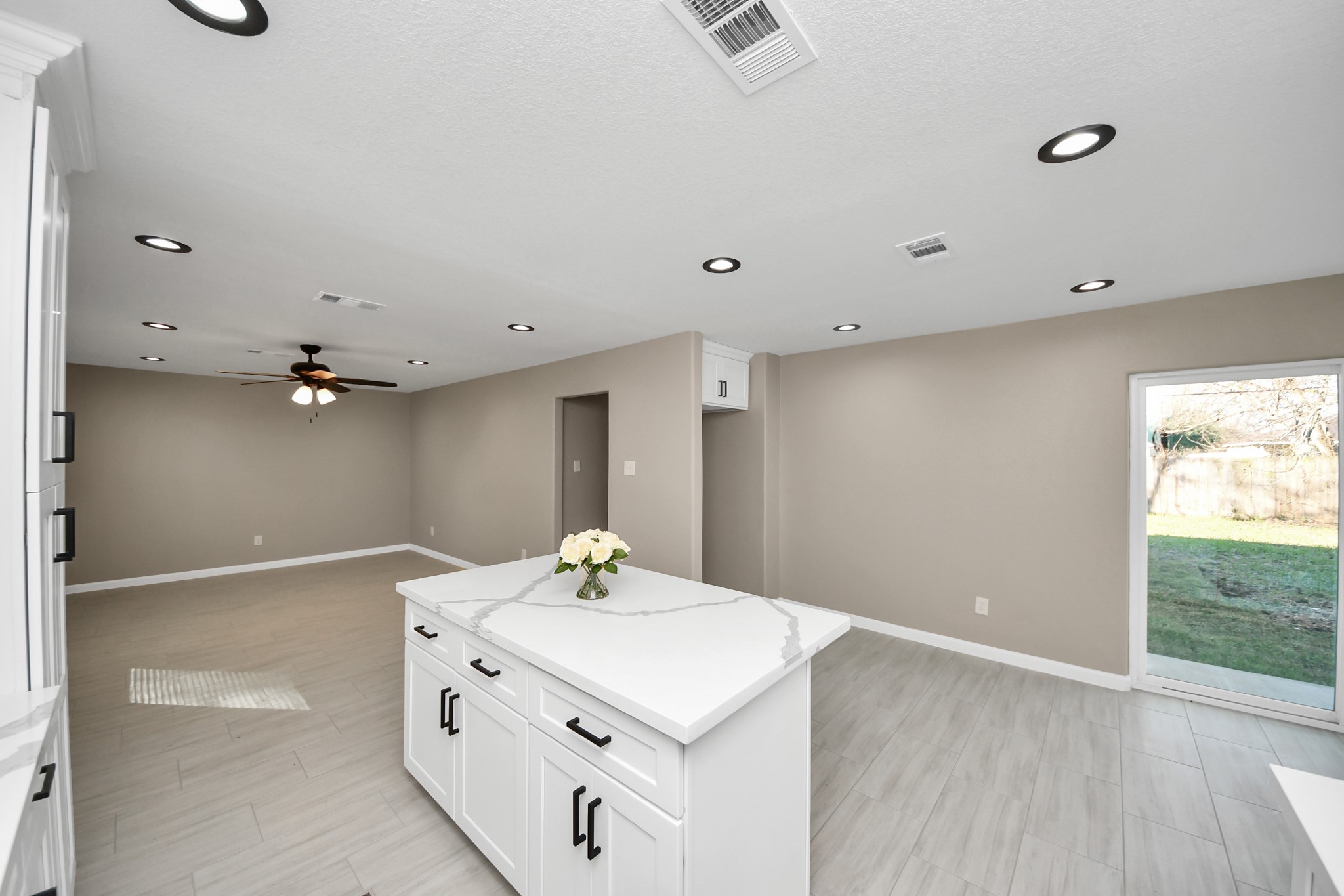 8918 Vinearbor Street Houston, TX 77033 - Photo 18 of 35 a bathroom with a sink vanity and tub