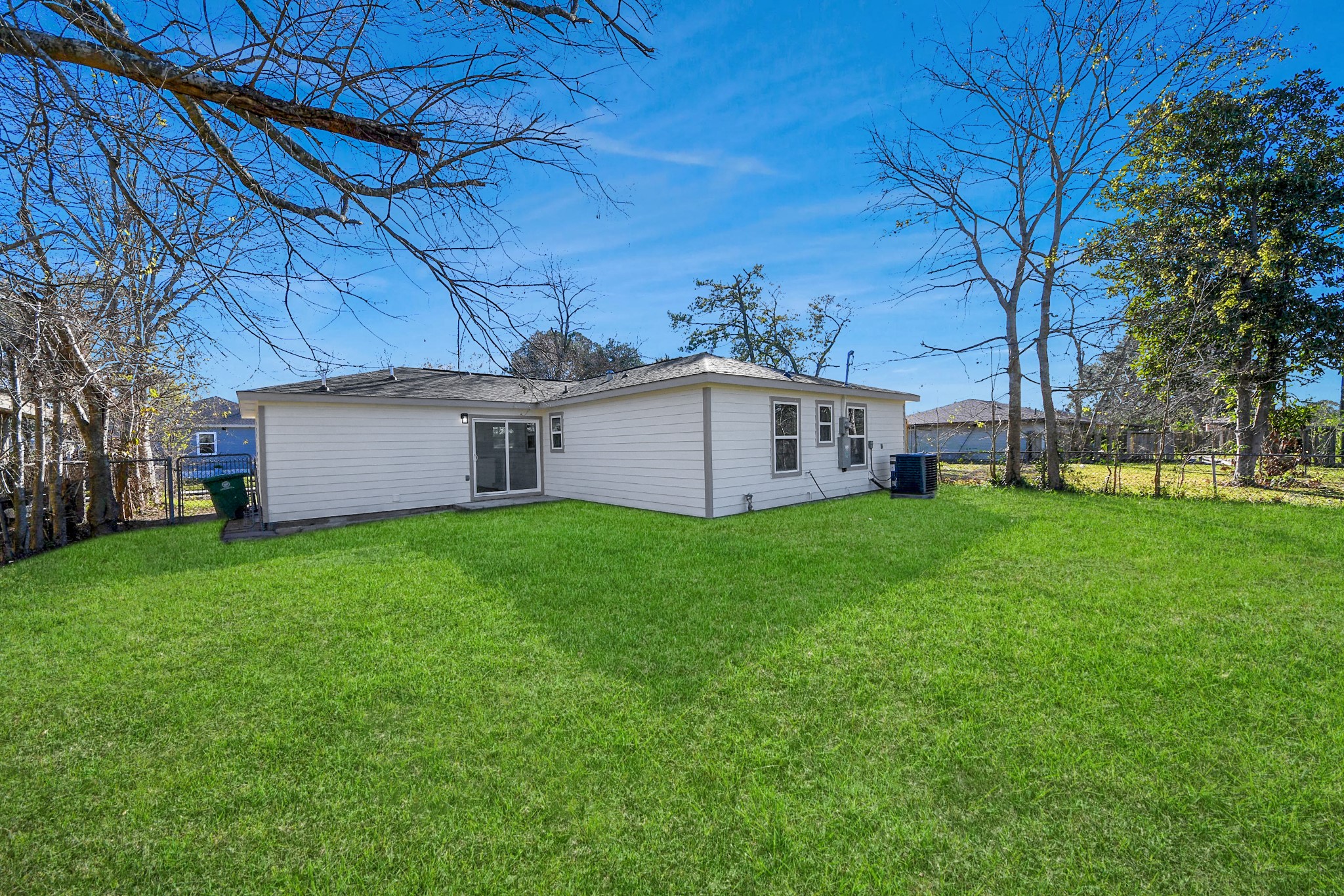 8918 Vinearbor Street Houston, TX 77033 - Photo 6 of 35 a view of a house with a back yard