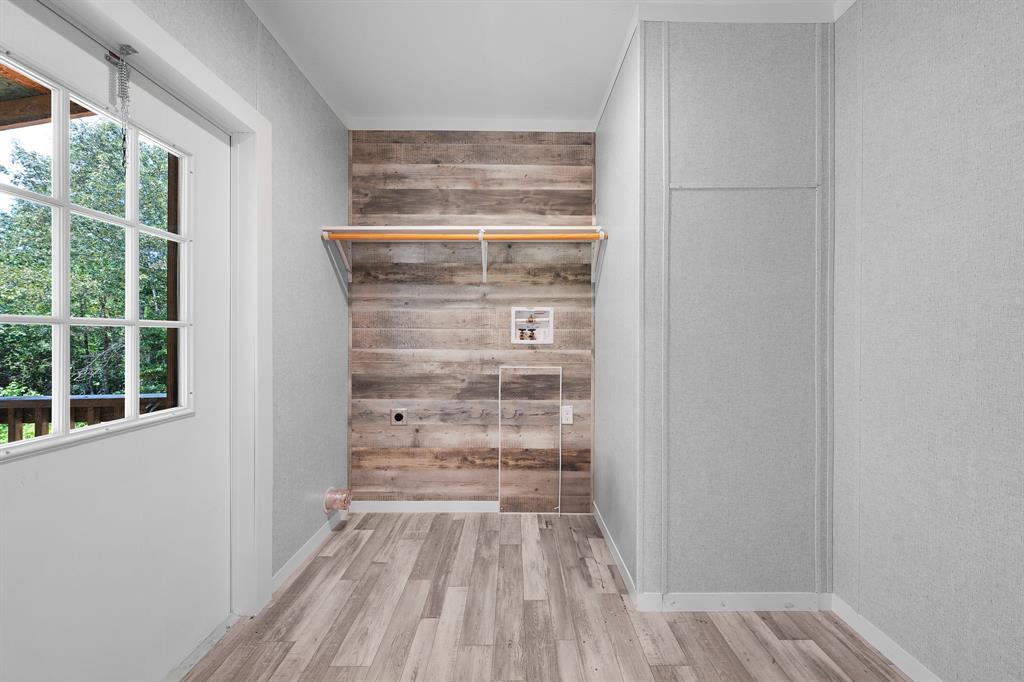 211 3900th Road Gilmer, TX 75644 - Photo 10 of 30 a view of walk in closet with empty racks