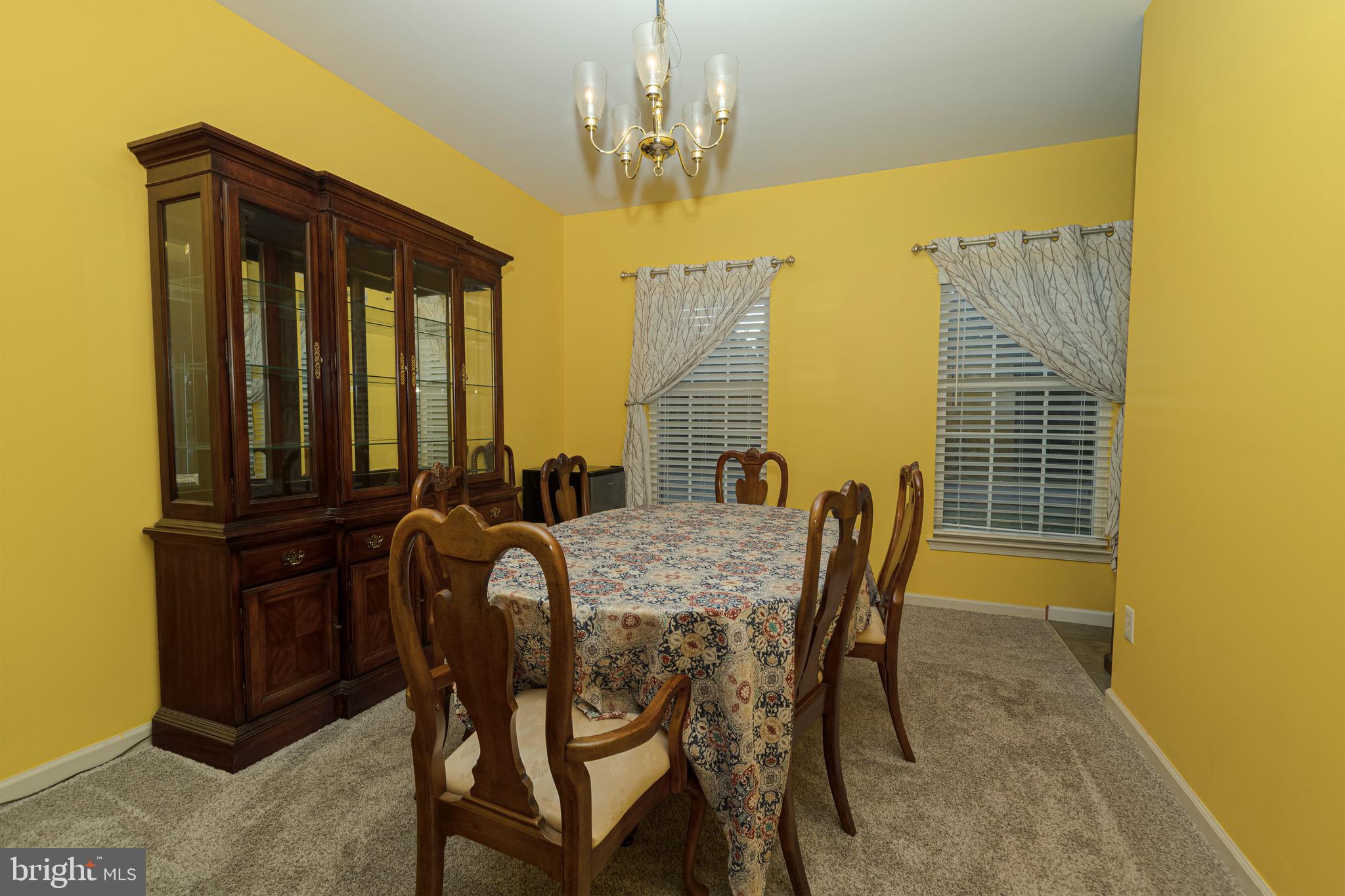 27 Basalt Street Townsend, DE 19734 - Photo 11 of 45 a view of a dining room with furniture and window