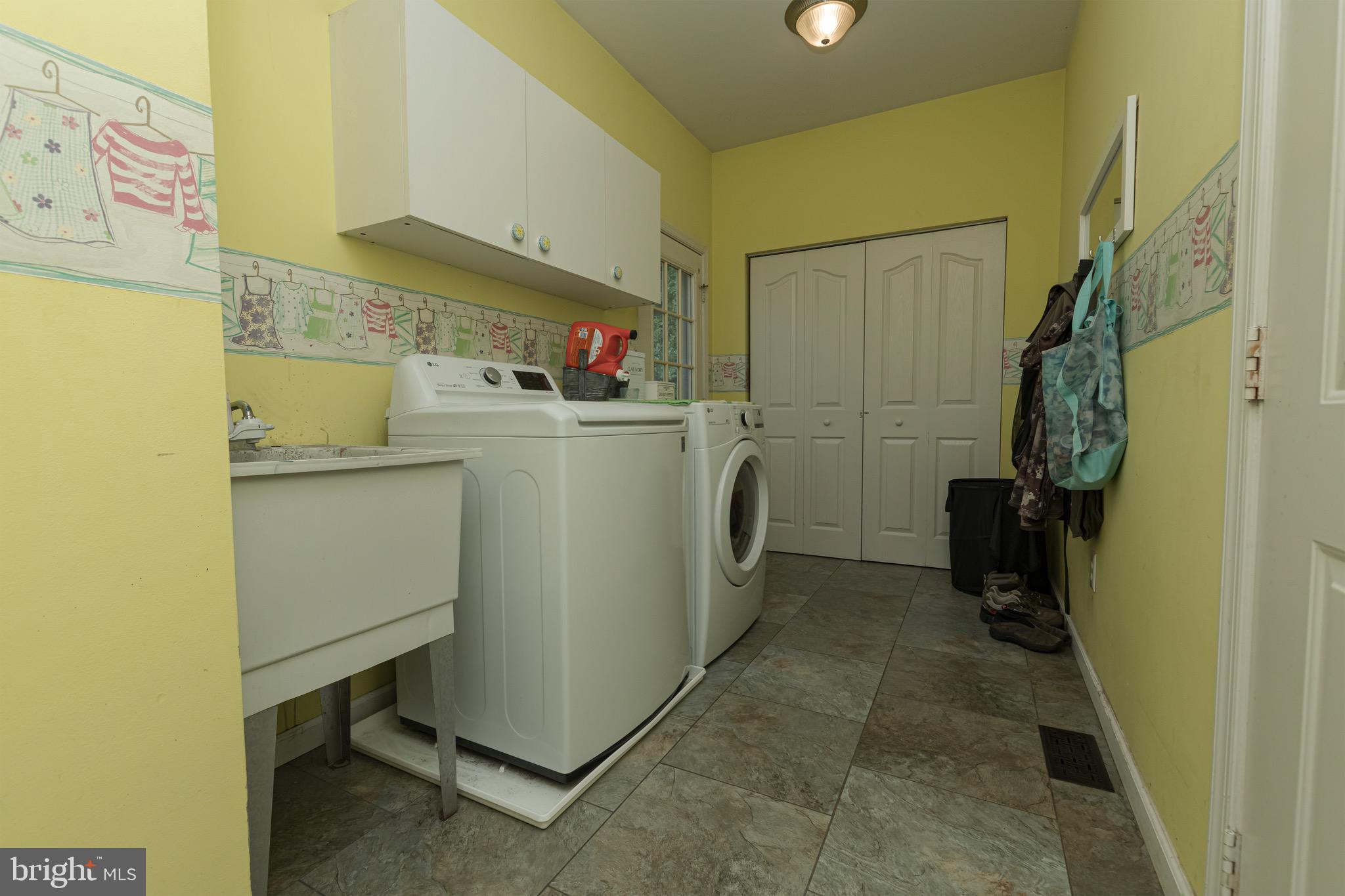 27 Basalt Street Townsend, DE 19734 - Photo 22 of 46 a utility room with dryer and washer