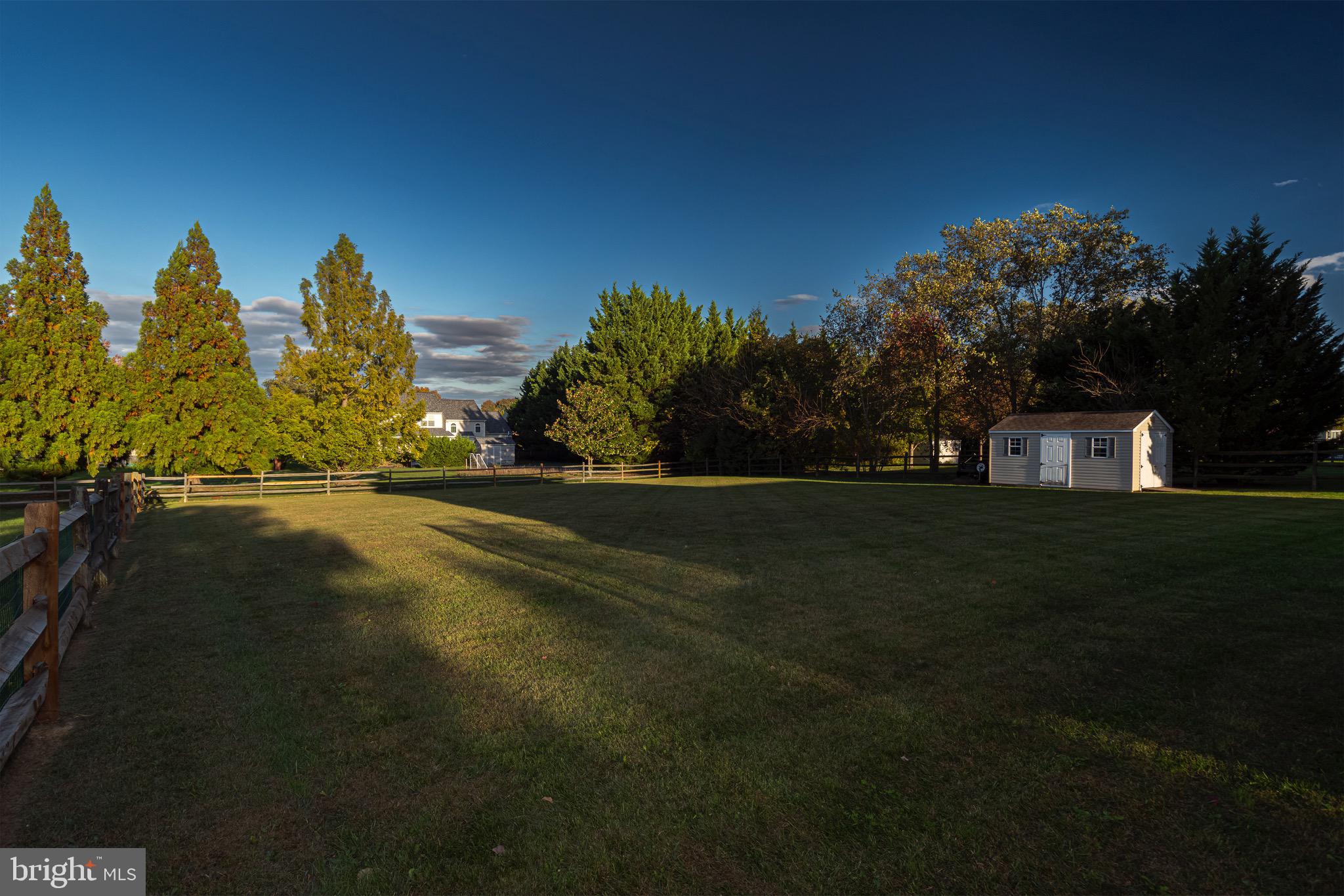 27 Basalt Street Townsend, DE 19734 - Photo 38 of 45 a view of a field of grass and trees