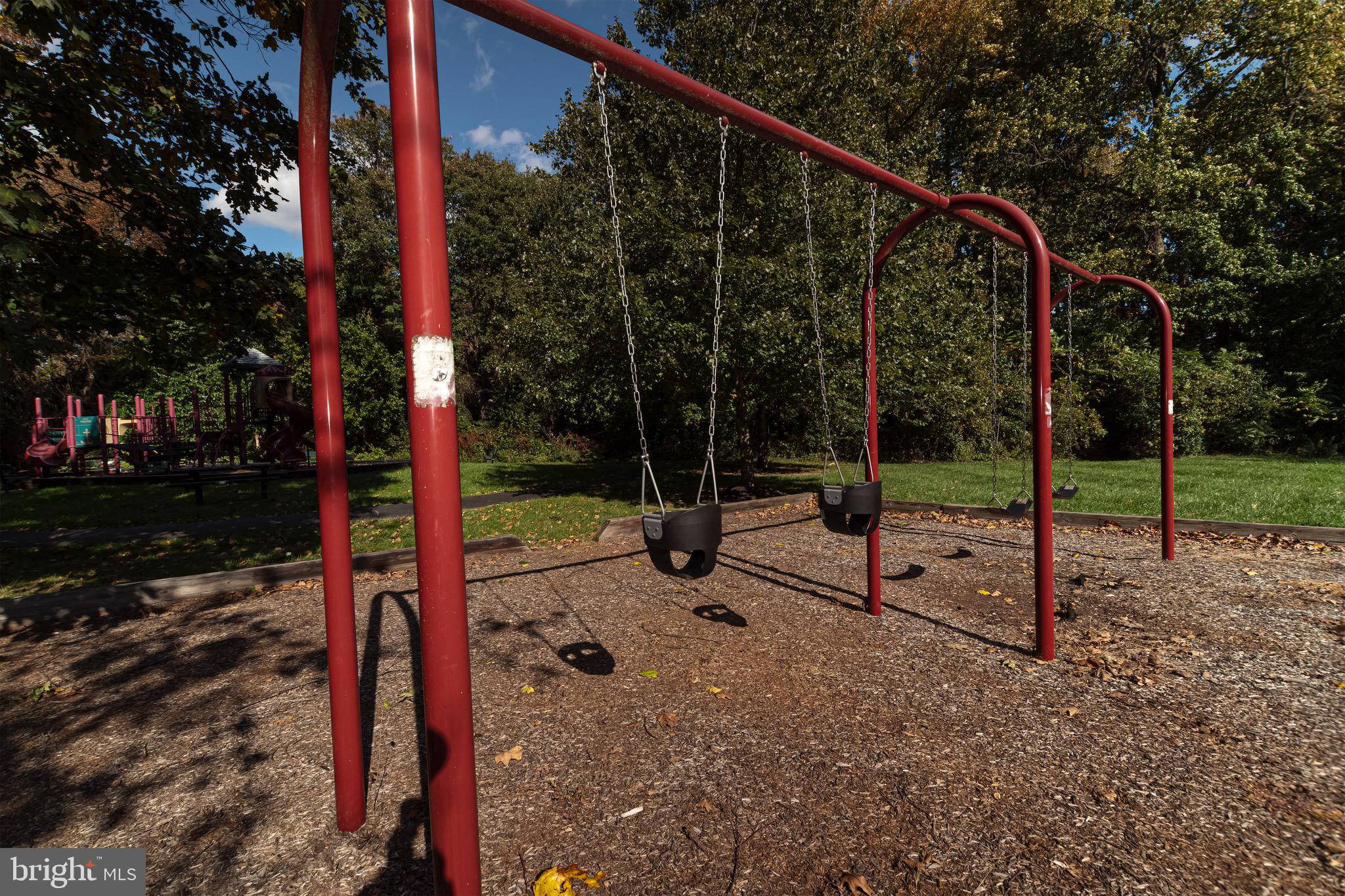 27 Basalt Street Townsend, DE 19734 - Photo 44 of 46 a view of a park with swings