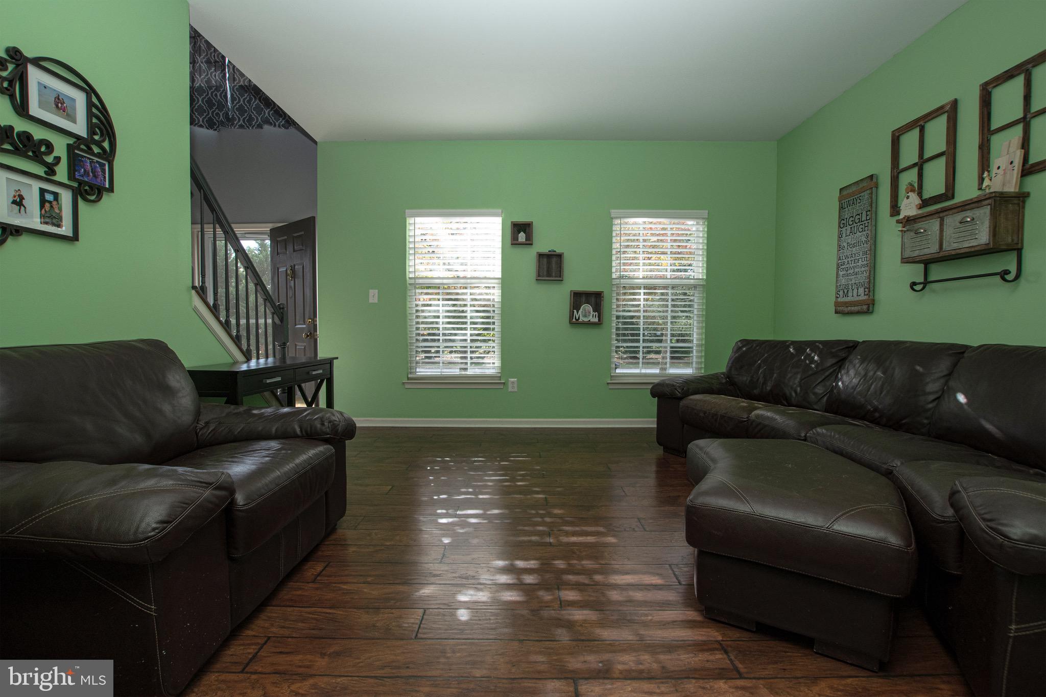 27 Basalt Street Townsend, DE 19734 - Photo 10 of 45 a living room with furniture and a window
