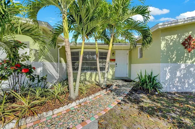 a plant is in front of a house