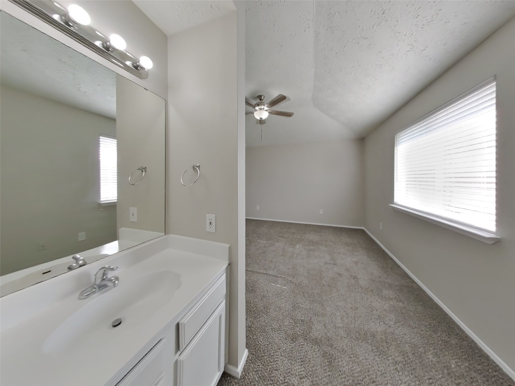 2802 North Spring Drive Spring, TX 77373 - Photo 11 of 19 a bathroom with a sink and a mirror