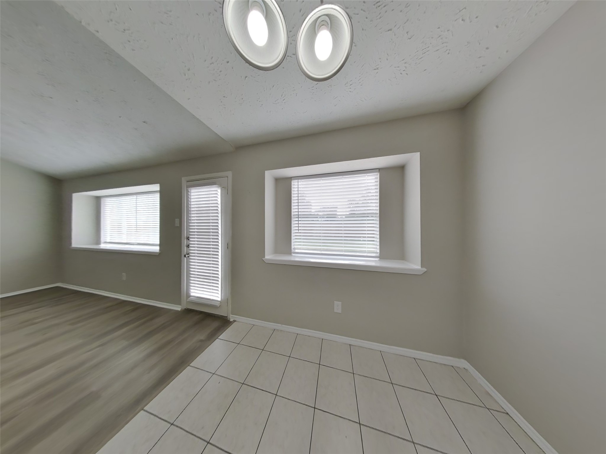 2802 North Spring Drive Spring, TX 77373 - Photo 5 of 19 an empty room that has a window