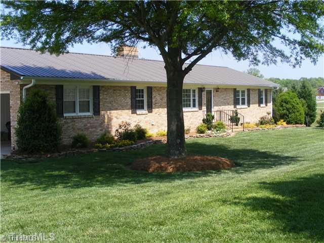 1731 Oak Ridge Road Oak Ridge, NC 27310 - Photo 1 of 16 Exterior Front.
