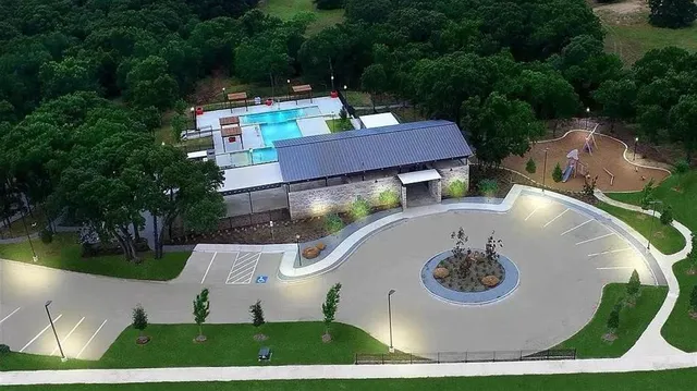 a view of swimming pool from a balcony