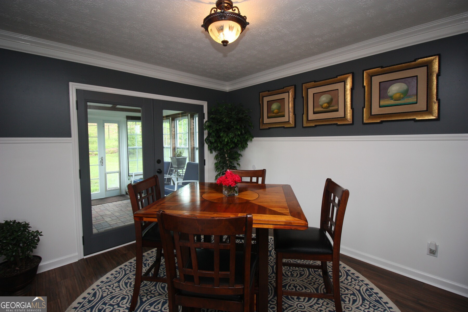 231 Murphy Road LaGrange, GA 30240 - Photo 11 of 24 a view of a dining room with furniture window and wooden floor