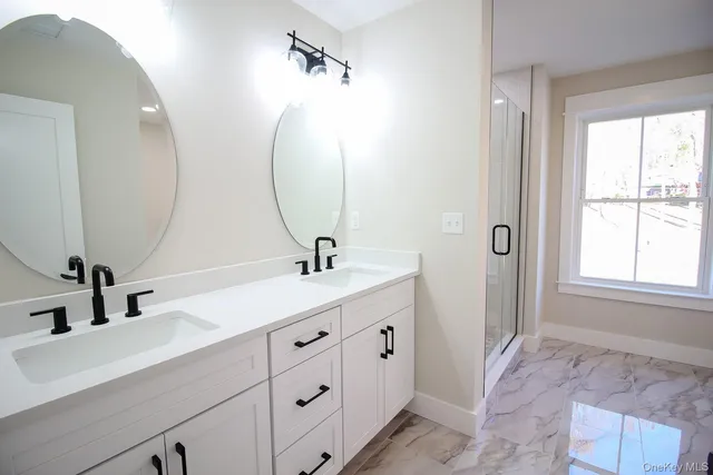 a white bath tub sitting in a bathroom