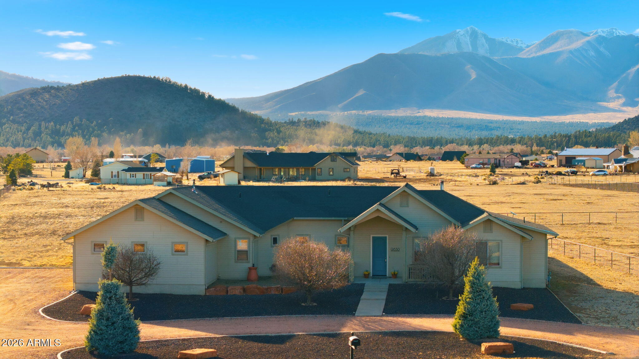a view of a house with a ocean view
