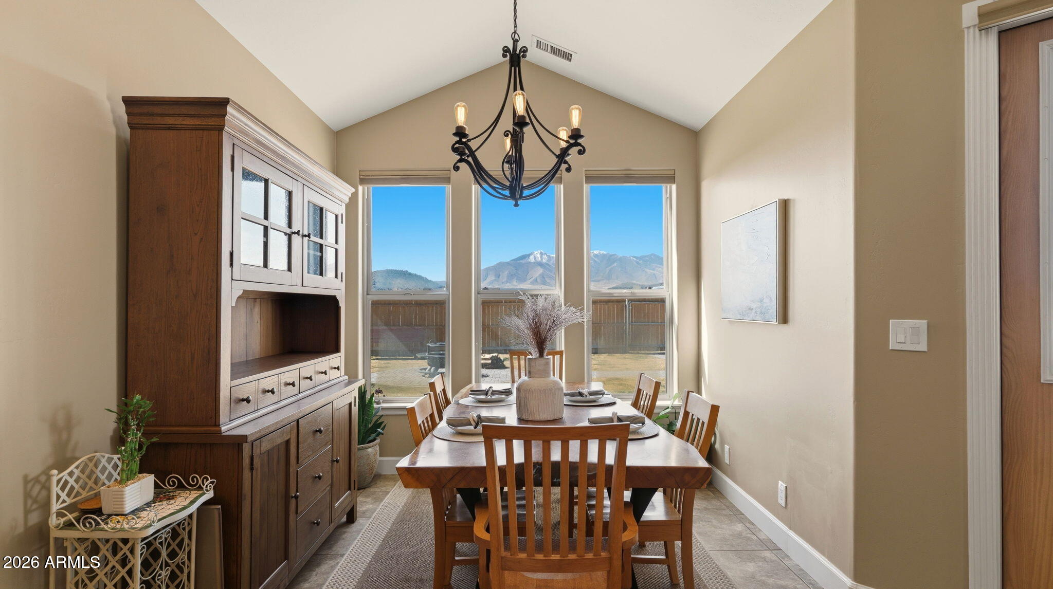 9630 North Aldrich Road Flagstaff, AZ 86004 - Photo 16 of 47 a view of a dining room with furniture window and outside view