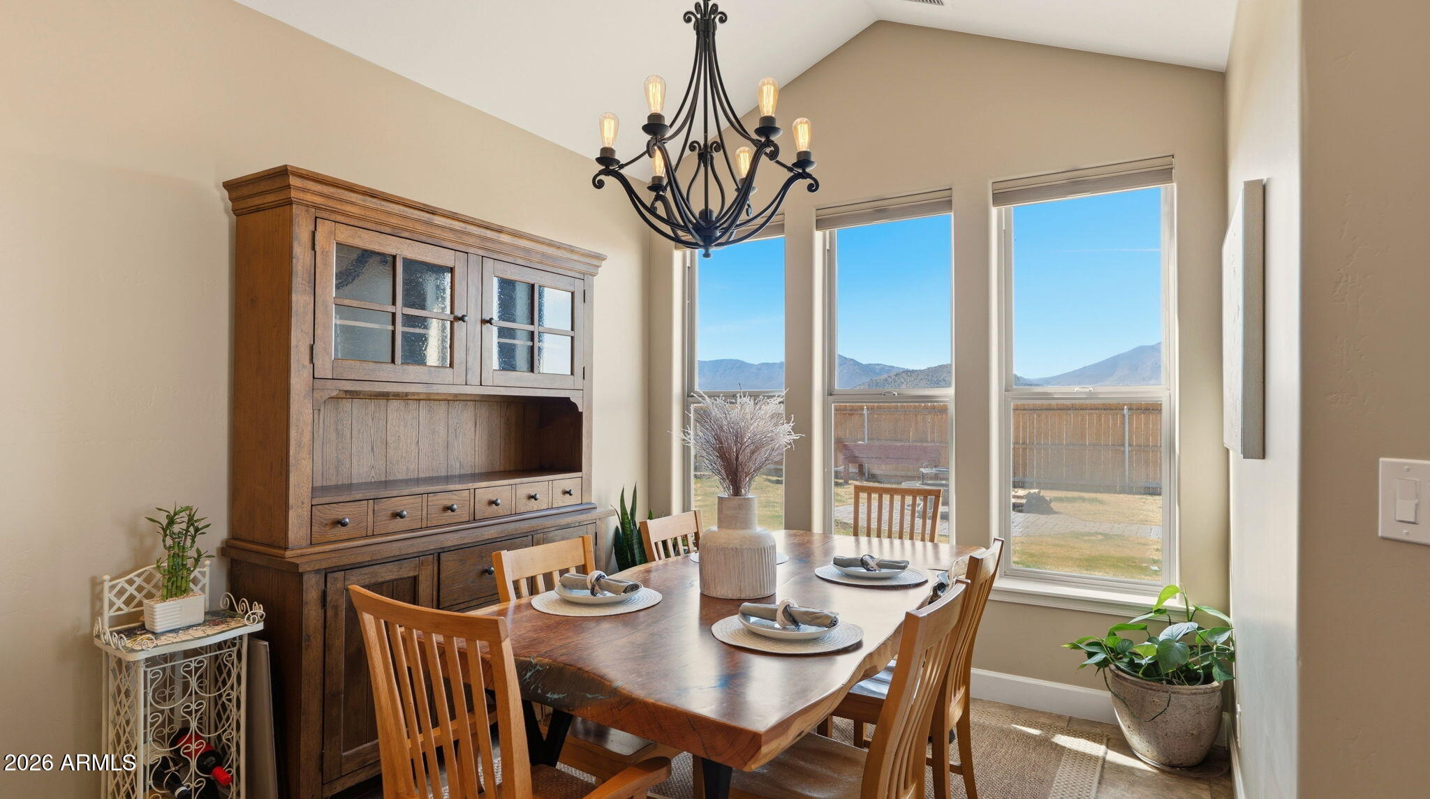 9630 North Aldrich Road Flagstaff, AZ 86004 - Photo 17 of 47 a view of a dining room with furniture window and outside view