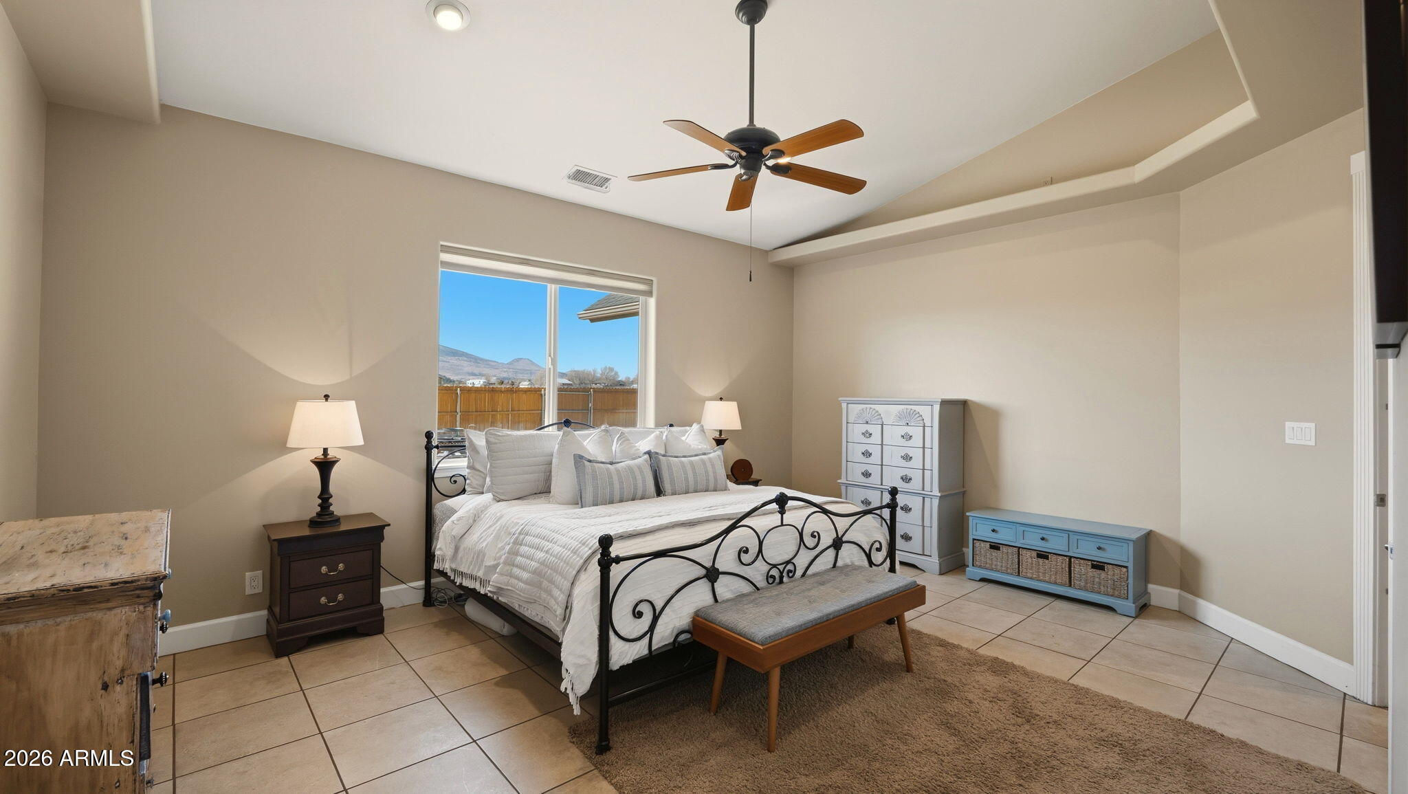 9630 North Aldrich Road Flagstaff, AZ 86004 - Photo 18 of 47 a bedroom with a bed and a ceiling fan