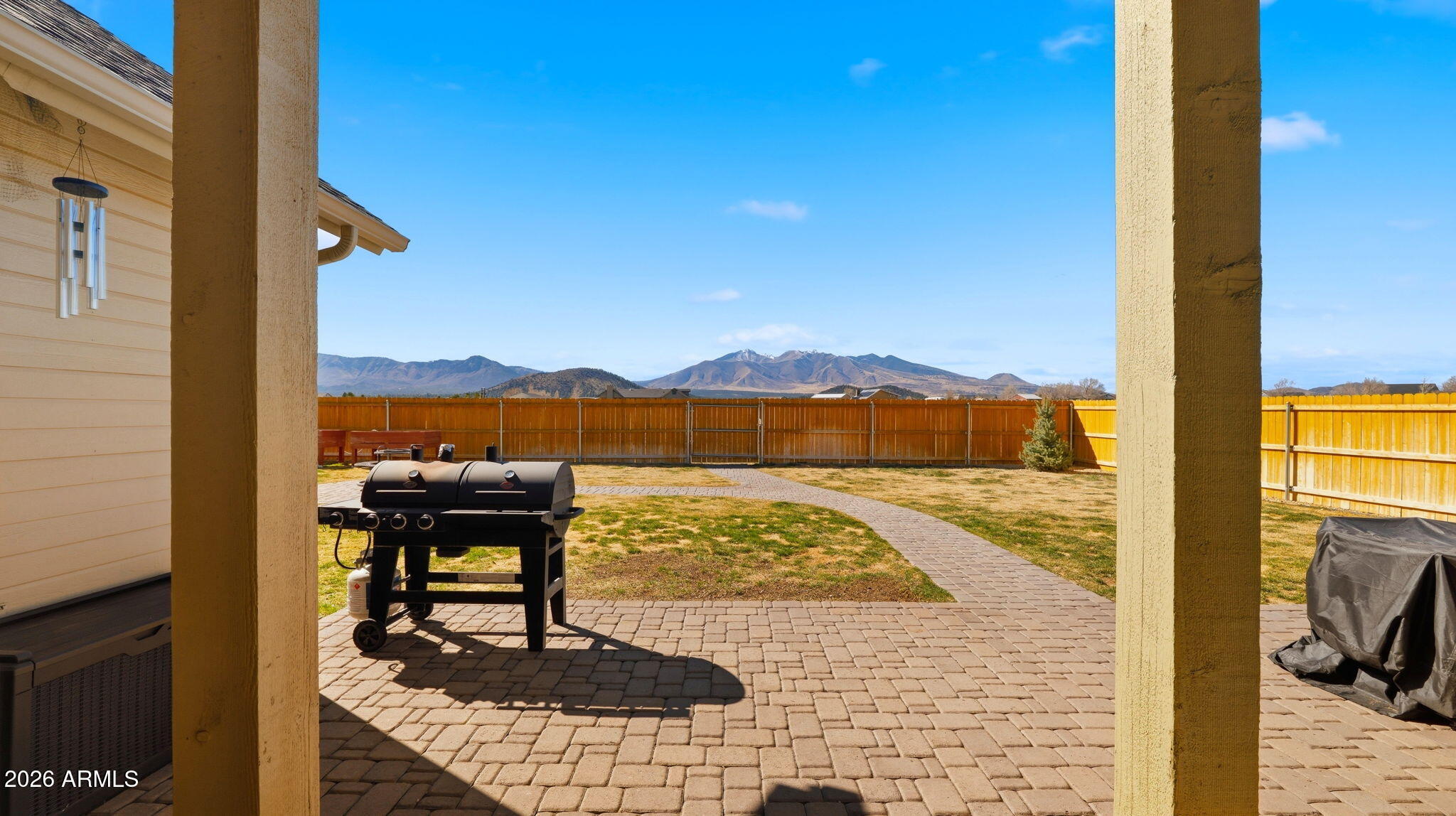 9630 North Aldrich Road Flagstaff, AZ 86004 - Photo 32 of 47 a view of a lake with a table and chairs