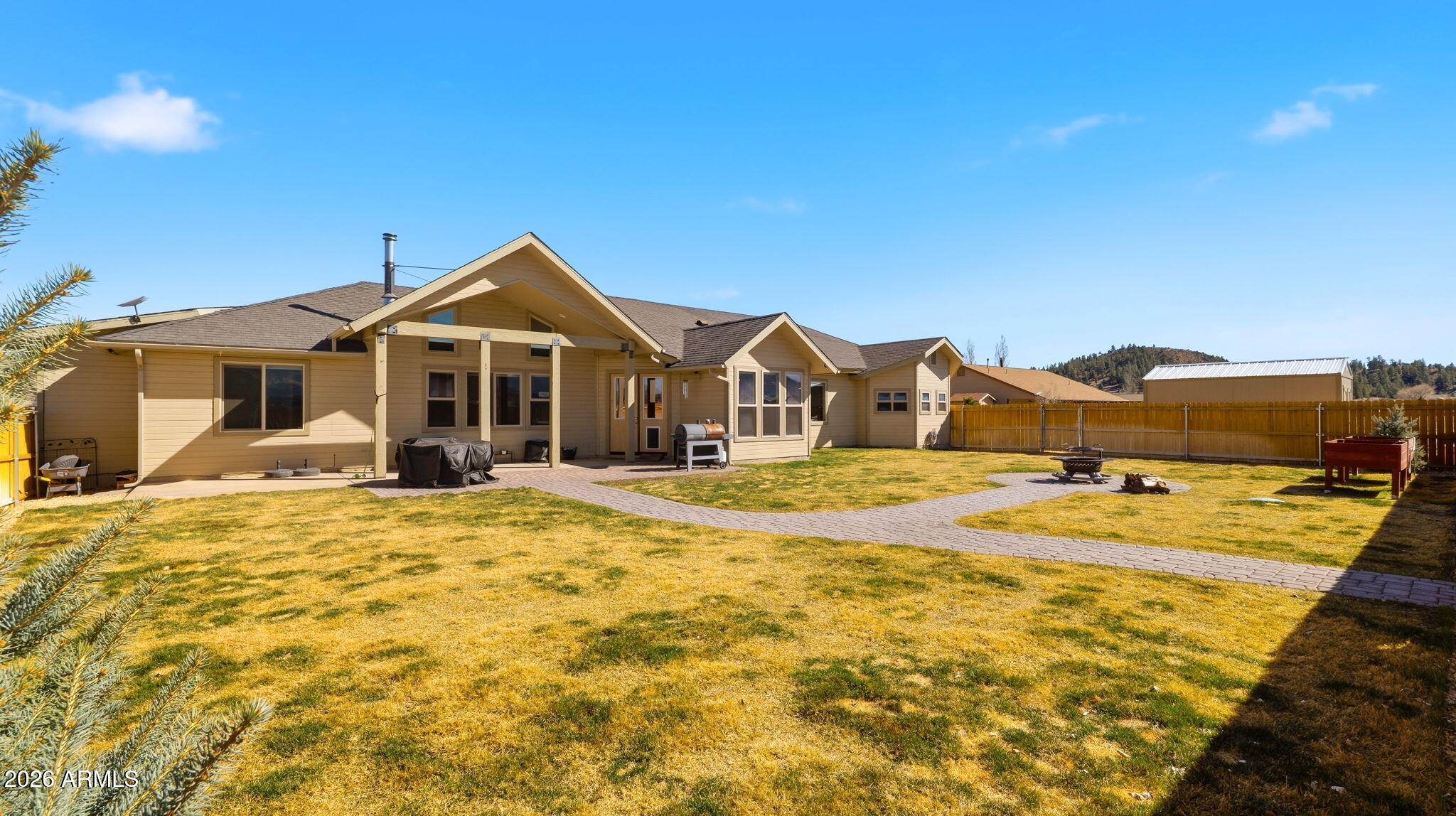 9630 North Aldrich Road Flagstaff, AZ 86004 - Photo 35 of 47 a view of a house with a swimming pool