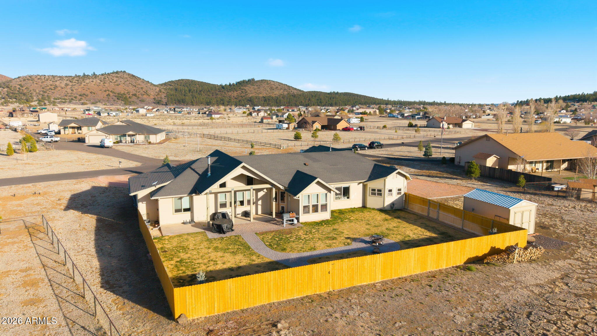 9630 North Aldrich Road Flagstaff, AZ 86004 - Photo 41 of 47 a view of a swimming pool with a table and chairs