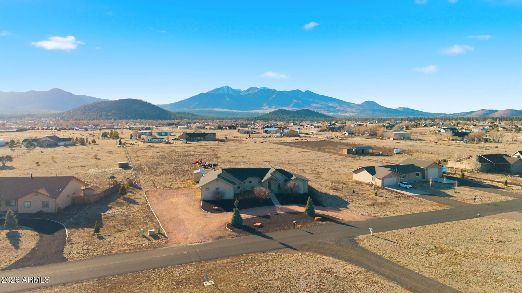 9630 North Aldrich Road Flagstaff, AZ 86004 - Photo 44 of 47 a view of a lake with a mountain