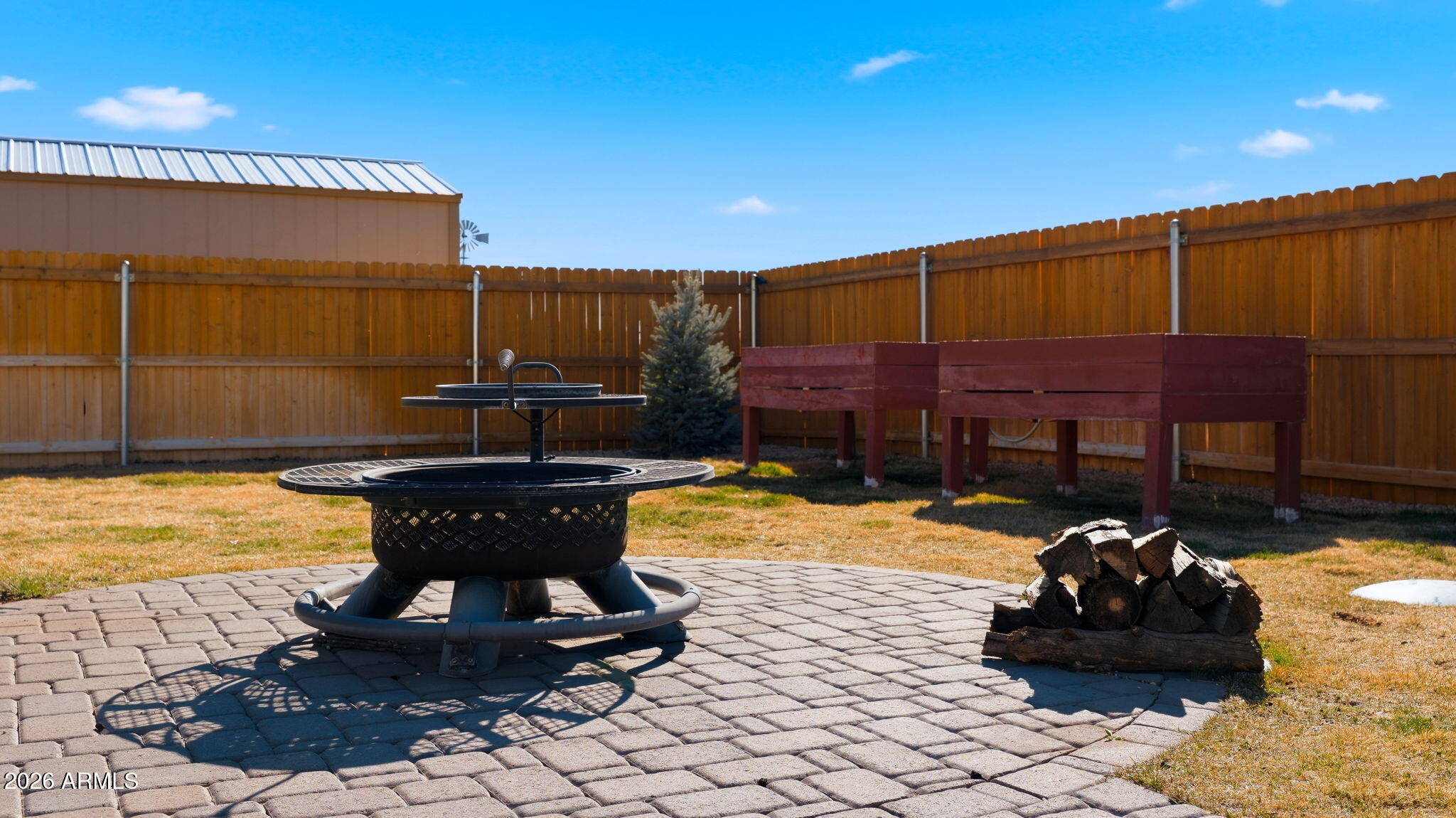 9630 North Aldrich Road Flagstaff, AZ 86004 - Photo 46 of 47 a view of a backyard with sitting area