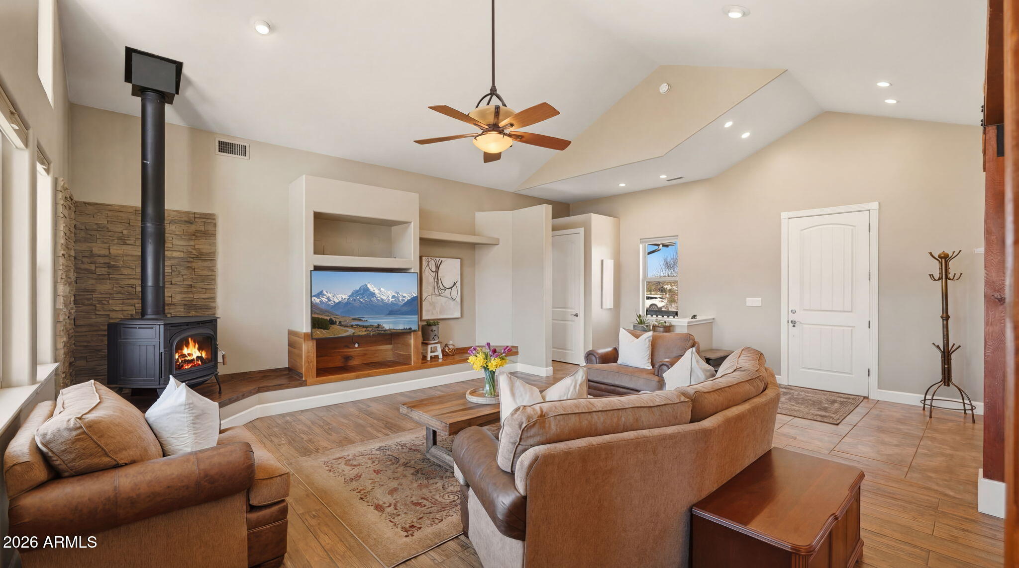 9630 North Aldrich Road Flagstaff, AZ 86004 - Photo 6 of 47 a living room with furniture and a chandelier
