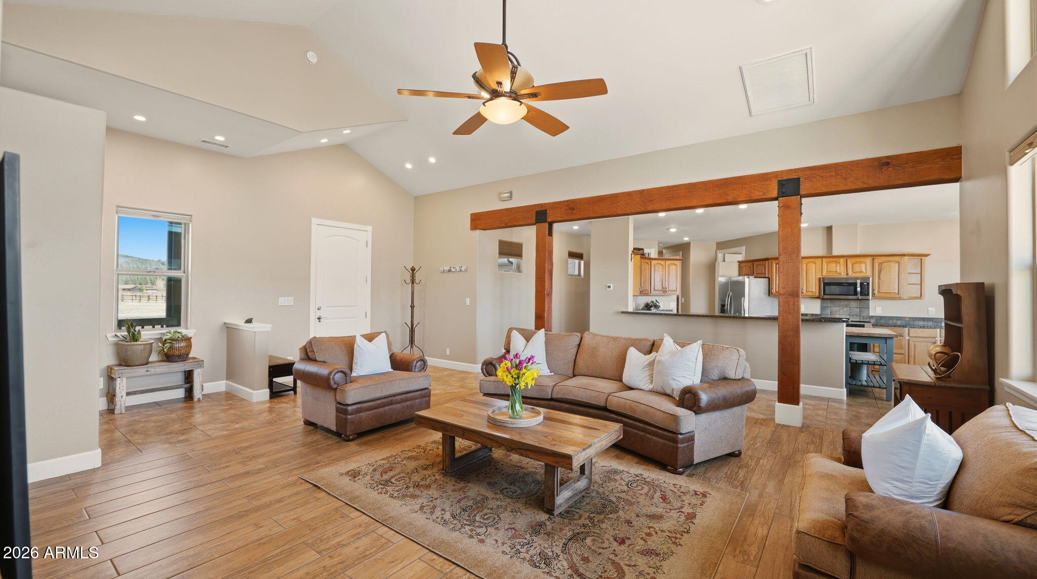 9630 North Aldrich Road Flagstaff, AZ 86004 - Photo 7 of 47 a living room with furniture and a large window
