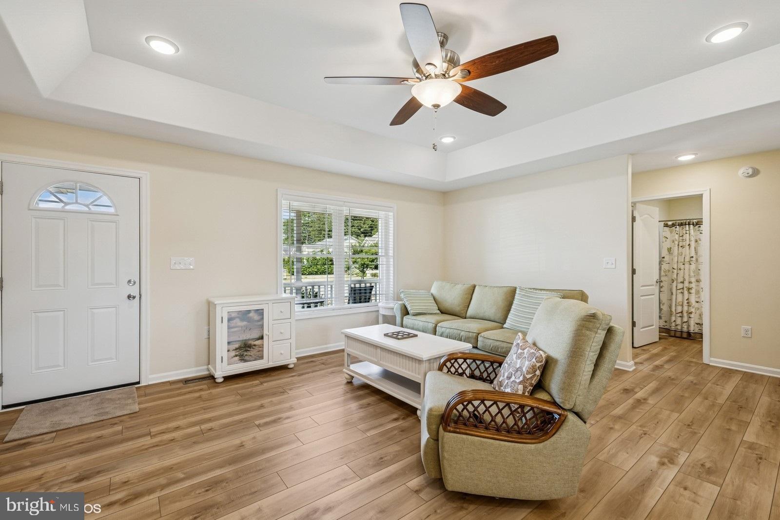 408 Summit Drive Seaford, DE 19973 - Photo 11 of 32 a living room with furniture and a large window