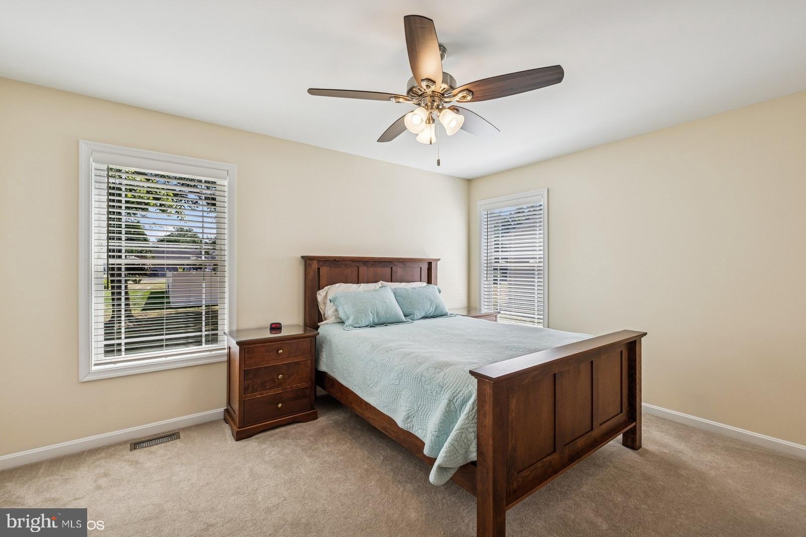 408 Summit Drive Seaford, DE 19973 - Photo 21 of 32 a bedroom with a bed dresser and a window
