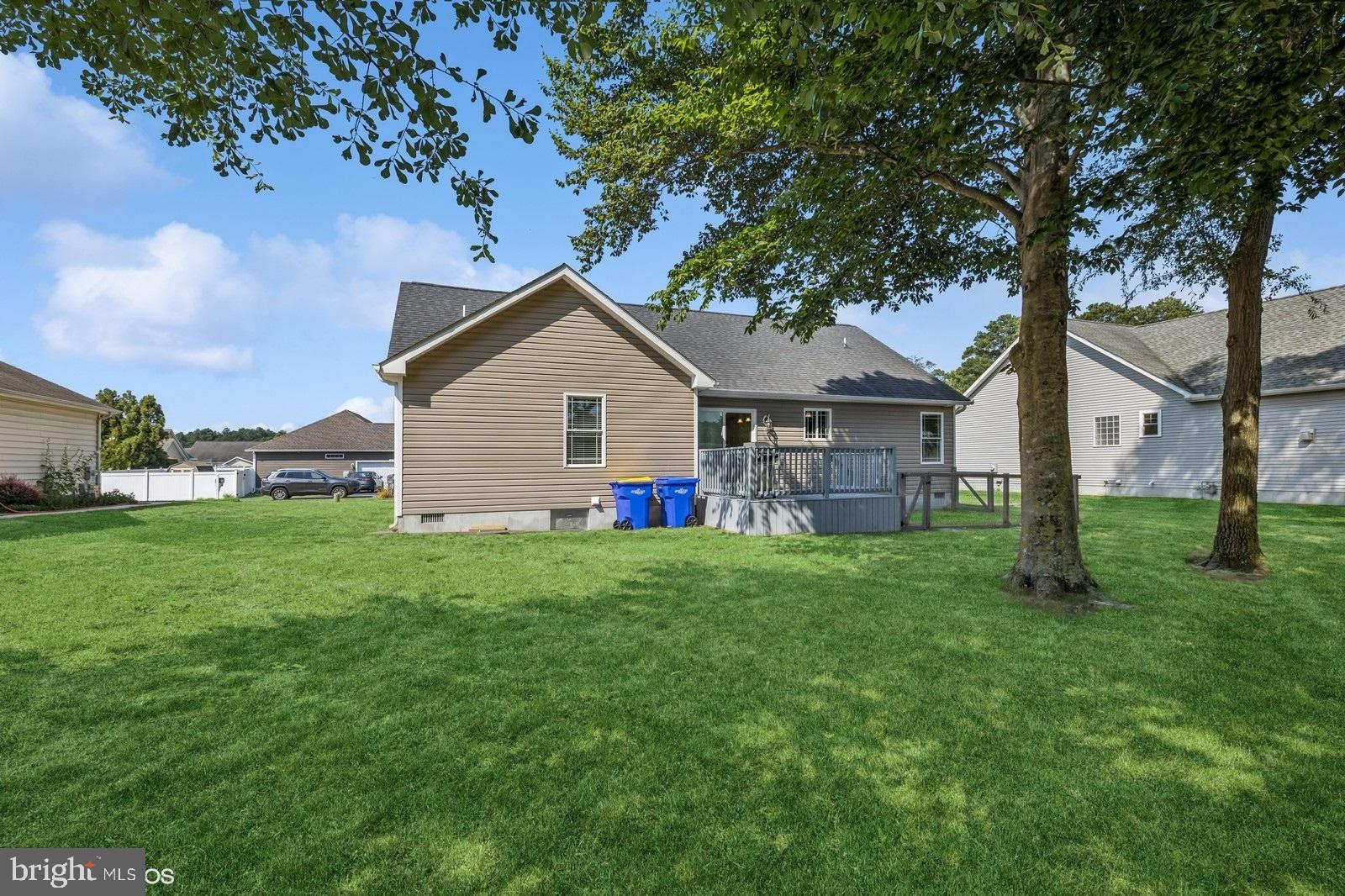 408 Summit Drive Seaford, DE 19973 - Photo 5 of 32 a view of a house with backyard and garden