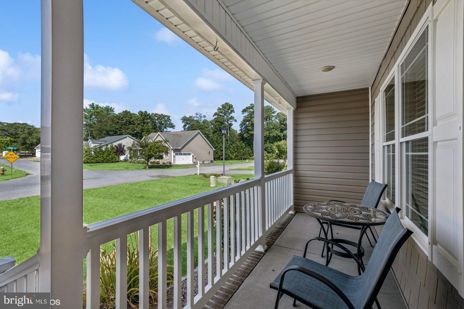 408 Summit Drive Seaford, DE 19973 - Photo 9 of 32 a view of a two chair in the balcony