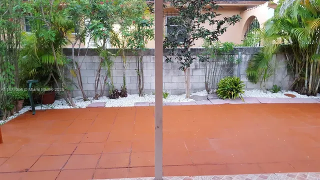 a view of swimming pool with an outdoor space and seating area