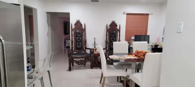 a dining room with furniture