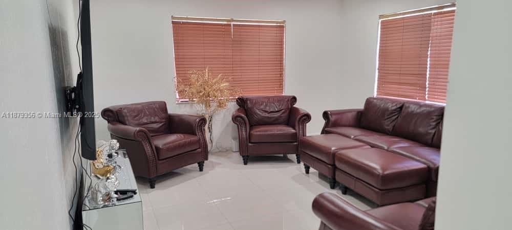 2915 Southwest 4th Street Miami, FL 33135 - Photo 21 of 29 a living room with furniture and a window