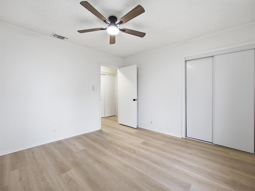 514 Dallas Street Italy, TX 76651 - Photo 25 of 34 wooden floor in an empty room