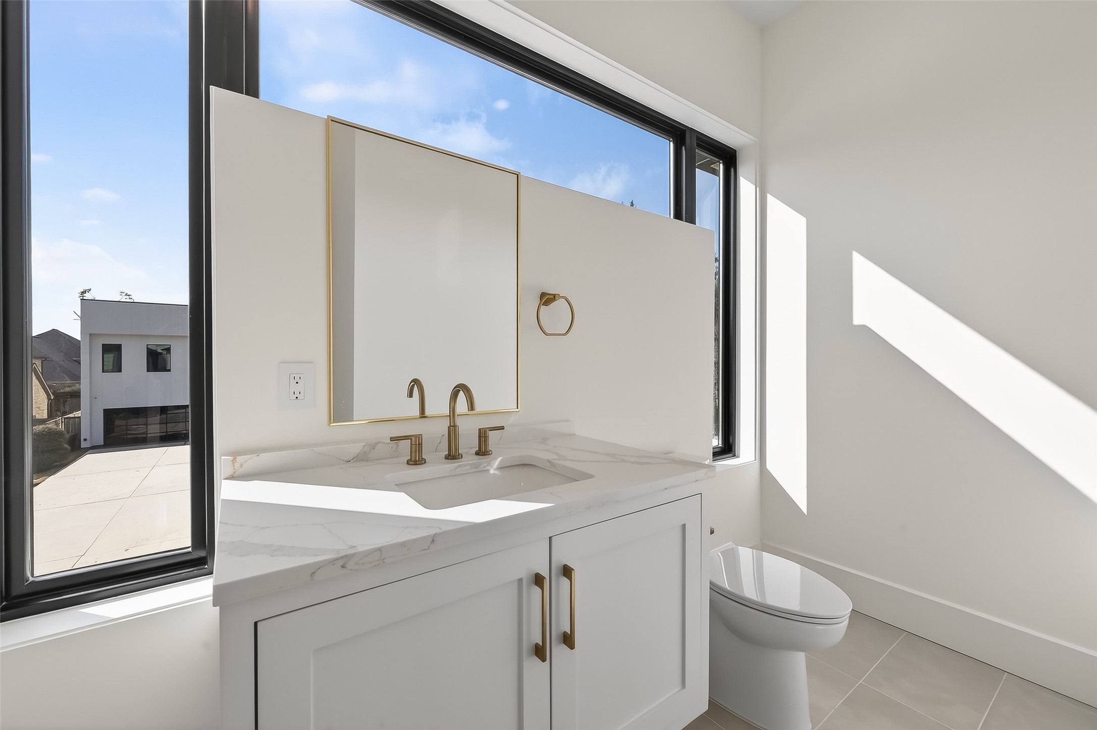 6534 Corbin Street Houston, TX 77055 - Photo 11 of 50 Beautiful powder bathroom conveniently integrated into the media room.