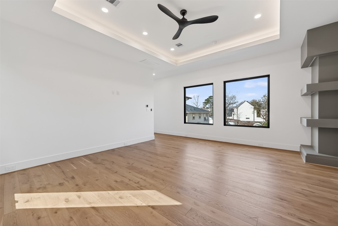 6534 Corbin Street Houston, TX 77055 - Photo 19 of 50 wooden floor in an empty room with a window