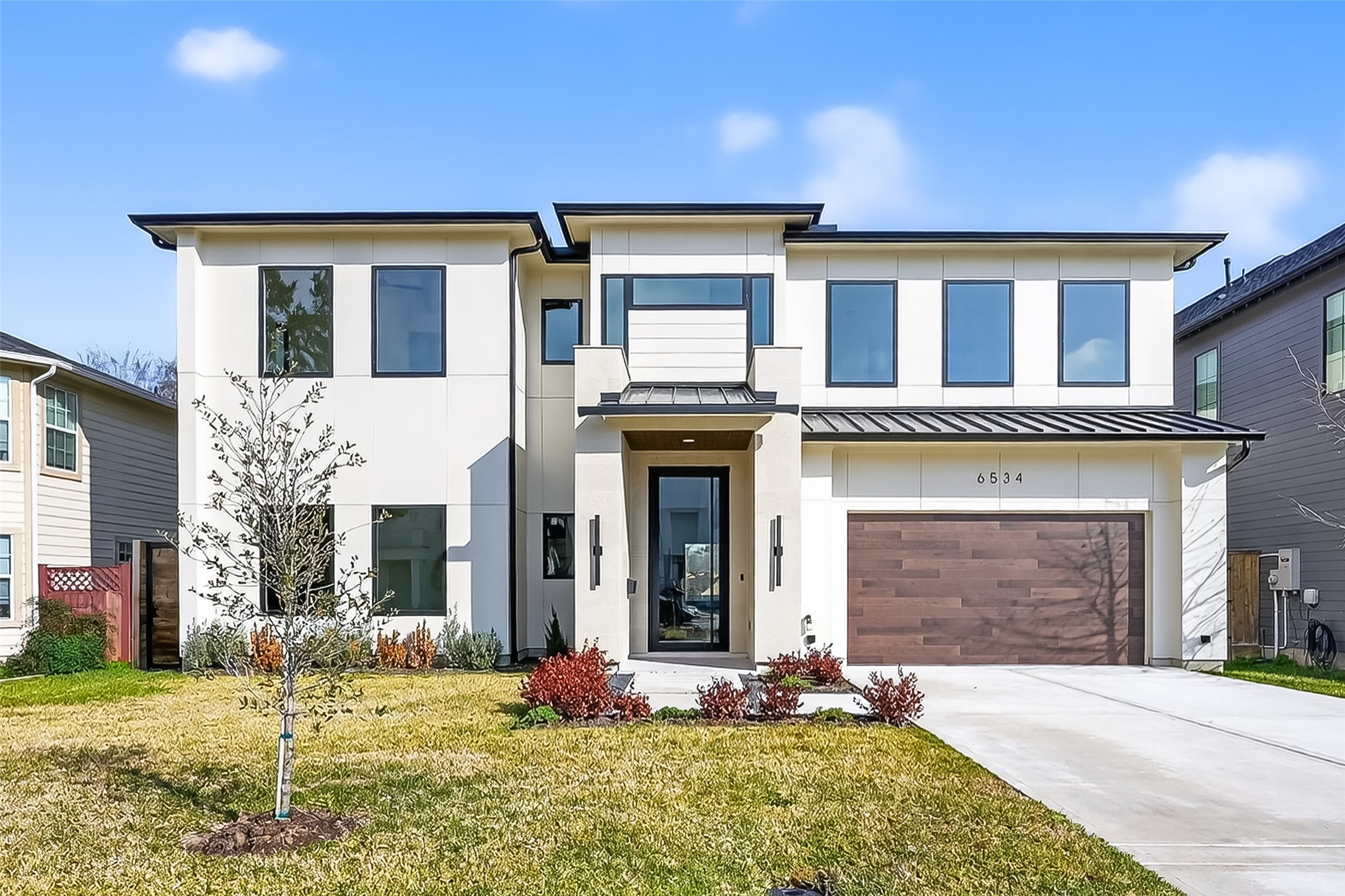 6534 Corbin Street Houston, TX 77055 - Photo 21 of 50 Inviting front walkway with fresh landscaping and bold architectural details.