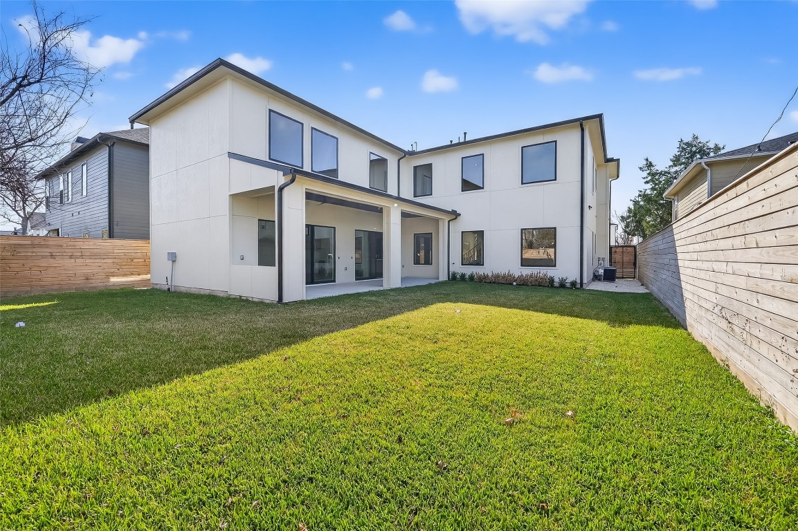 6534 Corbin Street Houston, TX 77055 - Photo 48 of 50 a view of a house with a backyard