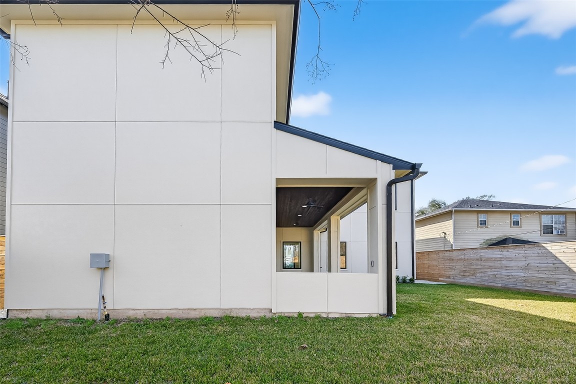 6534 Corbin Street Houston, TX 77055 - Photo 49 of 50 a front view of a house with garden