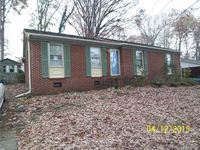 218 Northfield Drive Raleigh, NC 27609 - Photo 1 of 7 a front view of a house with garden