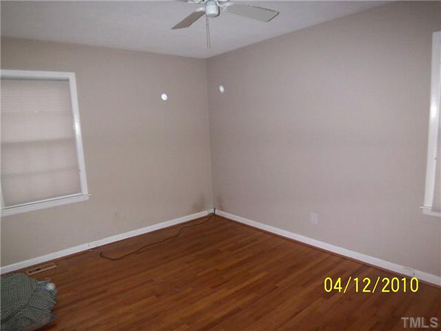 218 Northfield Drive Raleigh, NC 27609 - Photo 4 of 7 a view of an empty room with a window