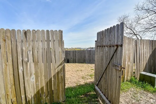a view of a wooden fence