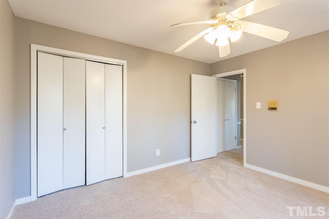 2004 Brocton Place Durham, NC 27712 - Photo 11 of 29 a view of a chandelier fan and closet area