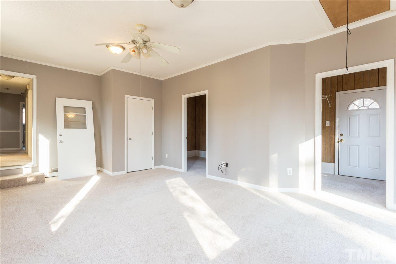 2004 Brocton Place Durham, NC 27712 - Photo 15 of 29 a view of a room with a windows and ceiling fan
