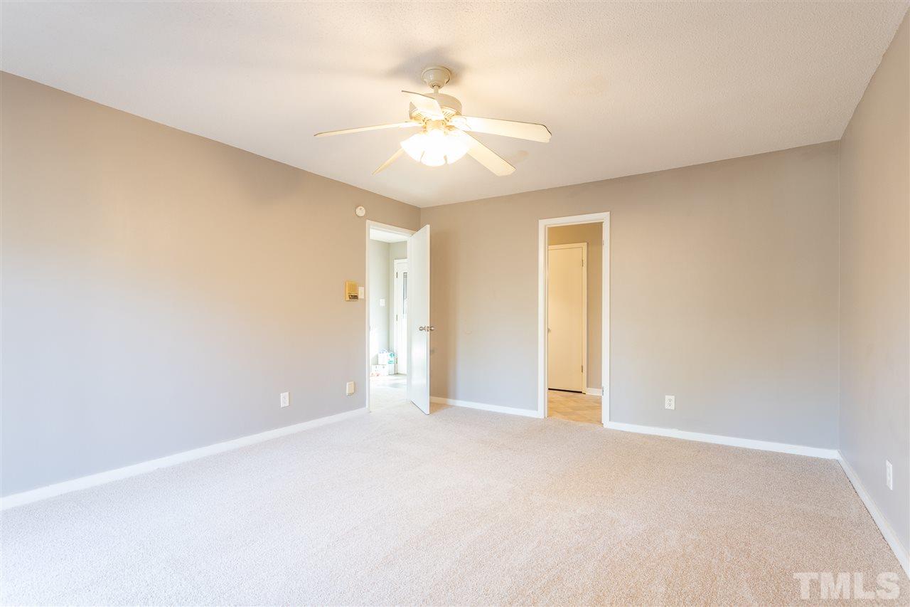 2004 Brocton Place Durham, NC 27712 - Photo 17 of 29 a view of an empty room and chandelier fan