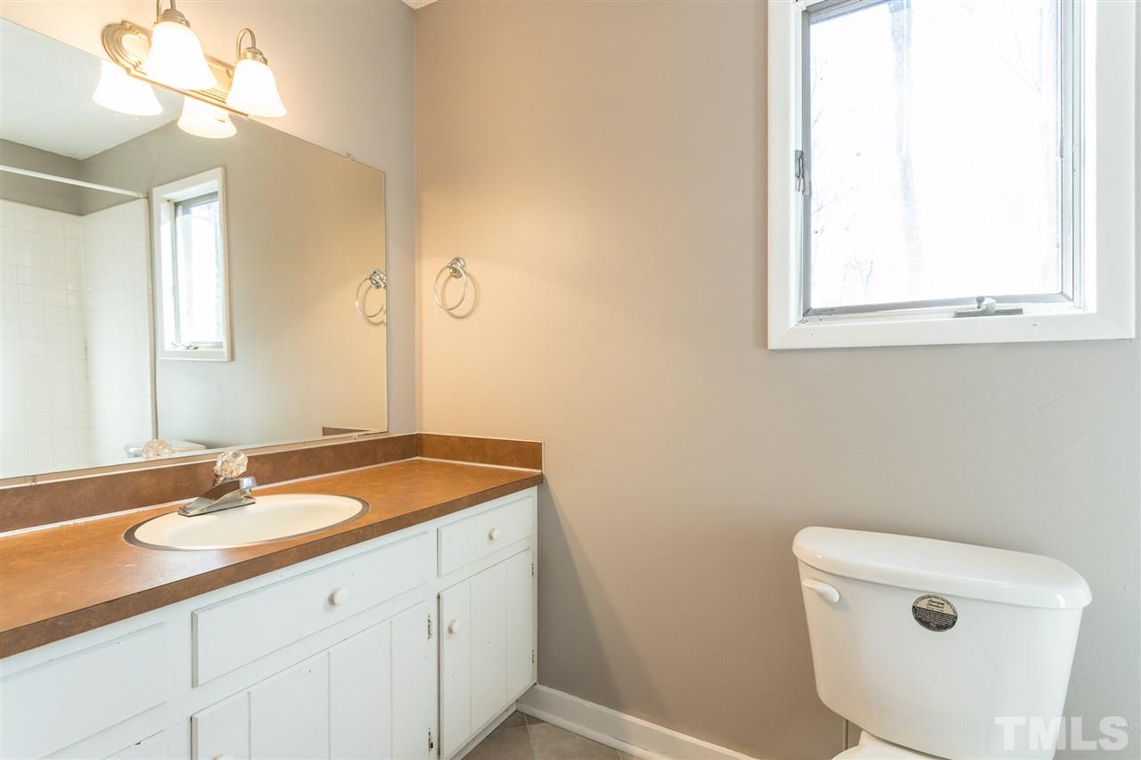 2004 Brocton Place Durham, NC 27712 - Photo 19 of 29 a bathroom with a sink and a toilet