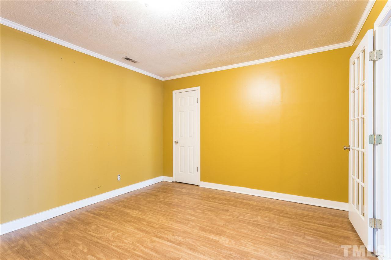 2004 Brocton Place Durham, NC 27712 - Photo 25 of 29 a view of empty room with wooden floor