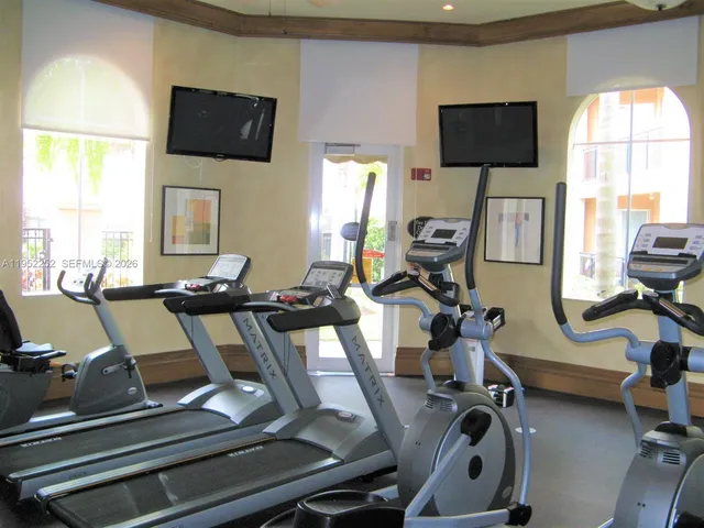 a view of a room with gym equipment