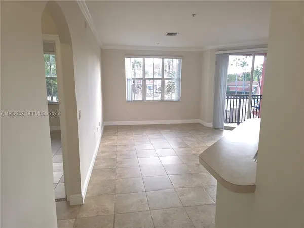 a view of entryway and hall with a window